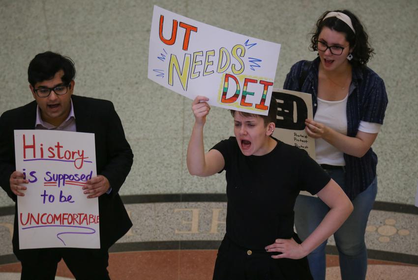 UT Austin grad student Lee Kravchenko participates in a chant during a sit-in for the protection of academic freedom and DEI at the Capitol on Mar. 23, 2023.
