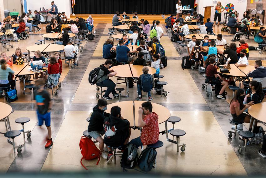 Students eat lunch in the cafeteria at Chapa Middle School in Kyle on Aug. 24, 2021.