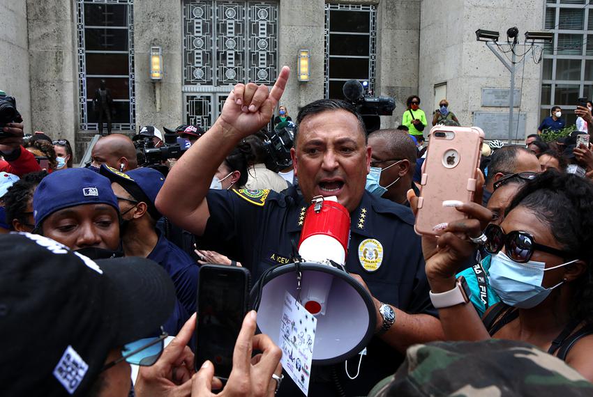 Houston Police Chief Art Acevedo responds to demonstrators about police accountability at a rally for George Floyd at Houston City Hall.