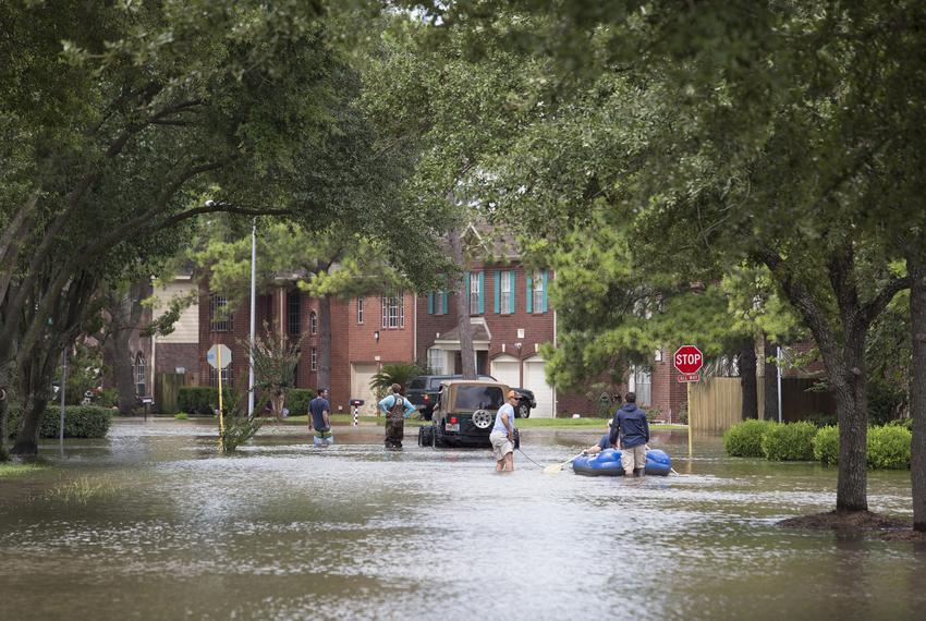 Flood waters in a neighborhood along Eldridge Parkway flooded by waters released from the Addicks Reservoir, in Houston on Wednesday, Aug. 30, 2017.