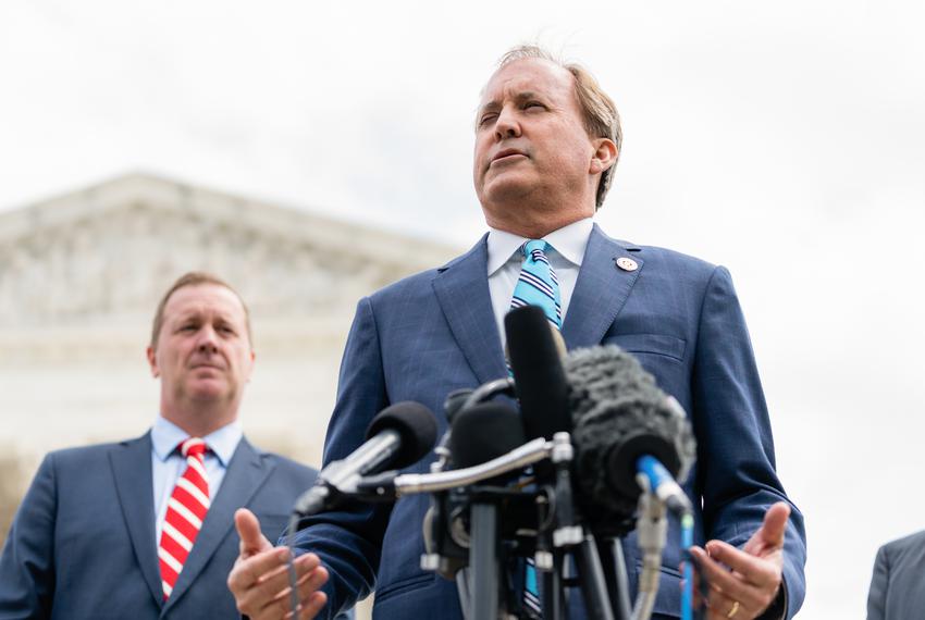 Texas Attorney General Ken Paxton speaks at a press conference at the U.S. Supreme Court in Washington, D.C. on April 26, 2022. Earlier, the U.S. Supreme Court heard oral arguments for Texas v. Texas, the enforcement of the Trump-era “remain in Mexico” policy that required asylum seekers to stay in Mexico as they waited for hearings in U.S. immigration court. (Eric Lee for The Texas Tribune).