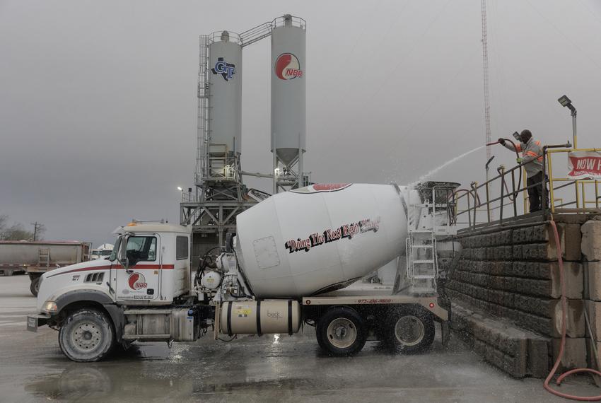 A concrete truck is washed at a concrete batch plant in Gunter, TX on March 21, 2023.