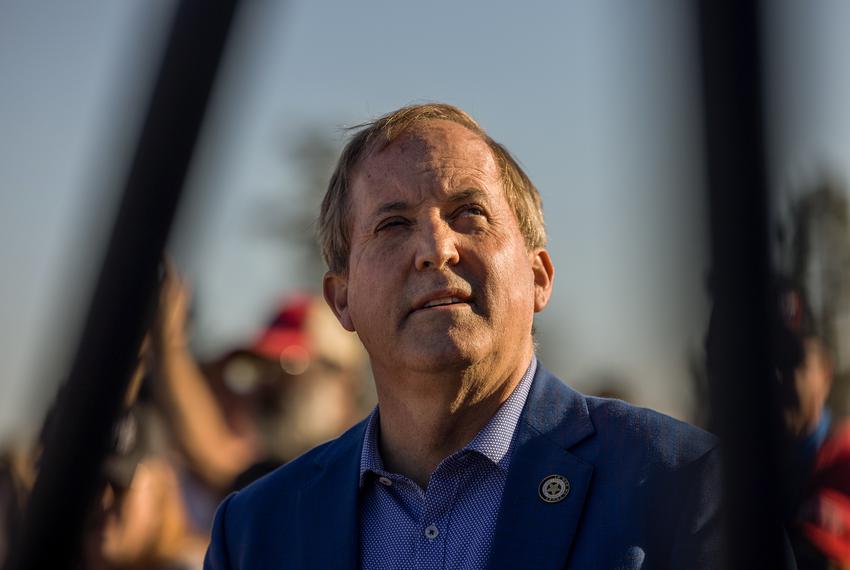 Attorney General Ken Paxton conducts an interview with Right Side Broadcasting Network at a Trump Rally in Conroe on Jan. 29, 2022.